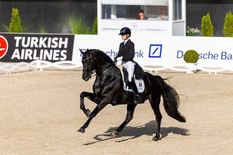 click to enlarge photo Lottie Fry and Glamourdale. (British Dressage photo)